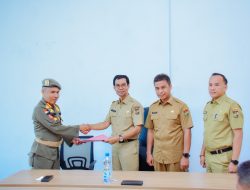 Pj.Sekda Kampar Ahmad Yuzar Saksikan Sertijab Plt.Kepala Dinas Kominfo Dari Irwan Ar Ke Arizon SE